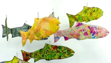 The content of the image is a map related to the School of Plastic Fish project, which involves upcycling plastics into sustainable fish mobiles. It is a drawing classified under the art category.