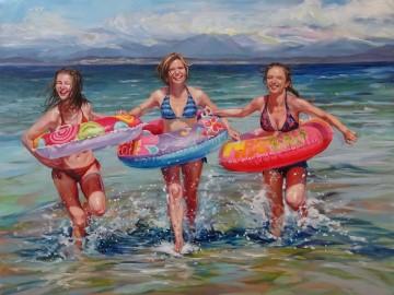 The image depicts a group of girls wearing swimsuits in the water, enjoying a beach day. The setting includes a cloudy sky and ocean waves. The girls seem to be having fun, possibly surfing or using a Lilo. The artwork is by Meghan Sharir.
