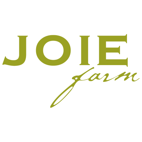 The image is a logo for Joie Farm Winery. The logo consists of the text "JOIE" with the word "Carm" underneath. It is a graphic design that focuses on typography and font.