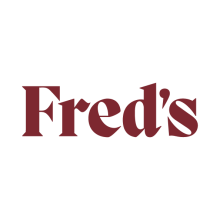 The image is a logo for Fred's restaurant. It features the text "Fred's" in a stylized font, showcasing graphic design and typography elements.