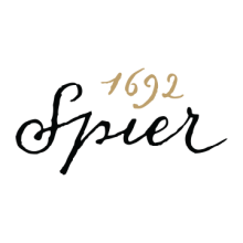 The image features a shape resembling an arrow with the text "1692" and "Spier" written inside. It is related to the Spier Winery logo and includes elements of handwriting, calligraphy, font, and typography.