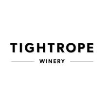 The image is a logo for Tightrope Winery. It features the text "TIGHTROPE WINERY" in a black and white color scheme with a focus on typography and graphic design.