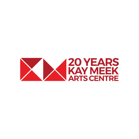 The image is a red and black sign that reads "20 YEARS KAY MEEK ARTS CENTRE." It is a graphic design poster with typography. The sign is related to the Kay Meek Arts Centre.